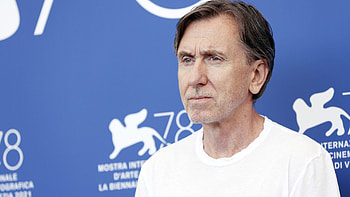 Tim Roth in McAfee-inspired film, Thrilling storyline, Riveting performance, Unique role HD wallpaper