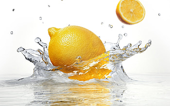 Falling lemon, Crystal clear water, Captivating graphy, wonder HD wallpaper