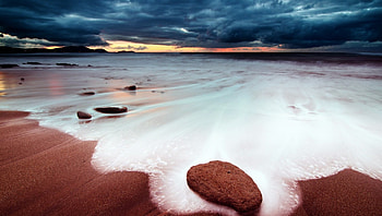 dark clouds over a red beach, sea, waves, foam, red, clouds, dark, beach HD wallpaper