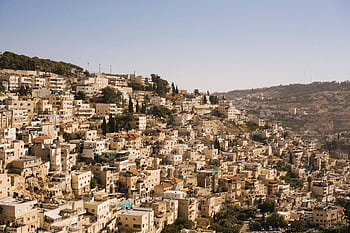 Stunning aerial view of the historic cityscape of Jerusalem, Israel, showcasing its unique architecture and landscape. HD wallpaper