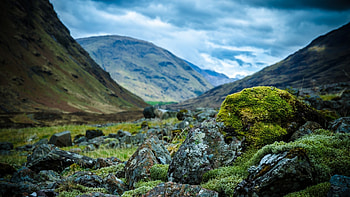 Preview scotland, mountains, stones, moss, clouds, cloudy HD wallpaper