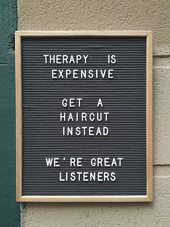 Funny hair salon sign suggesting haircuts over therapy for listening. HD phone wallpaper