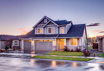 Elegant suburban home with driveway at sunset showcasing modern architecture. HD wallpaper