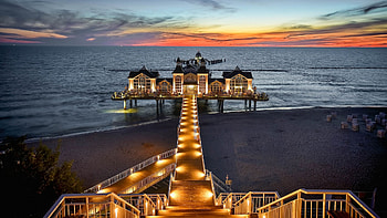 Pier at the Baltic Sea, island, lights, germany, clouds, colors, sky, ruegen, sunset HD wallpaper