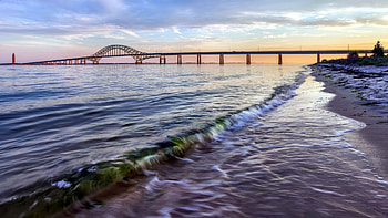 Lovely View, colorful, sand, morning, coast, colors, pier, peaceful, sunrise, beauty, beach, shore, waves, amazing, water, calm, ocean, sea, architecture, afternoon, beautiful, ocean waves, summer, purple, view, bridge, clouds, nature, sky, lovely, calmness, splendor HD wallpaper