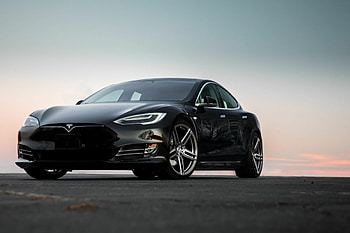 Tesla Model S, Sleek and black, Elegance on wheels, Stylish presence HD wallpaper