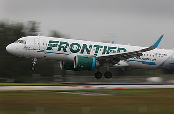 Frontier Airlines new routes, DFW Airport expansion, Enhanced connectivity, Low-cost travel HD wallpaper