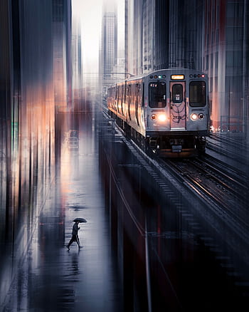 Dramatic cityscape with a fast-moving train and a commuter crossing in the rain at dusk. HD phone wallpaper