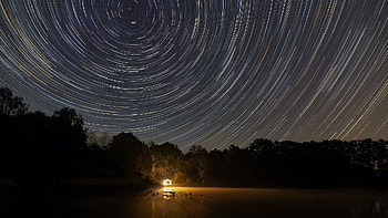 Startrails over lake, landscape, sky, light, evening HD wallpaper