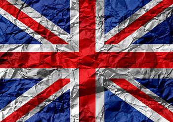 Crumpled texture of the Union Jack flag, symbolizing UK unity and heritage. HD wallpaper