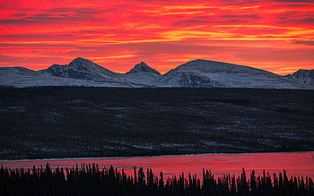 Sunset over the ice covered Swan Lake, Yukon, colors, sky, canada, mountains, trees HD wallpaper