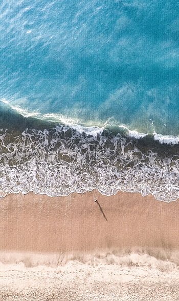 Vibrant aerial capture of Arugam Bay's sandy shore and turquoise waves. HD phone wallpaper