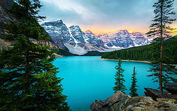 Moraine Lake, Banff National Park, mountains, canada, clouds, trees, sky, rocks, sunrise HD wallpaper