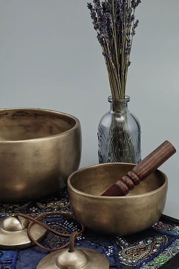 Tibetan singing bowls with lavender create a calming meditation space. HD phone wallpaper