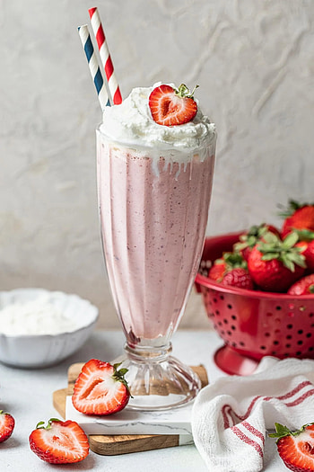 Strawberry milkshake, Refreshing drink, Homemade delight, Summertime favorite HD phone wallpaper