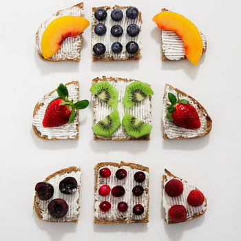 Explore delicious and healthy fruit-topped cream cheese toasts in a visually appealing arrangement. HD phone wallpaper