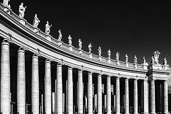 Dramatic black and white graph of Vatican colonnade with statues, highlighting classic architecture under a clear sky. HD wallpaper