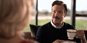 Ted Lasso charm, Heartwarming series, Jason Sudeikis brilliance HD wallpaper