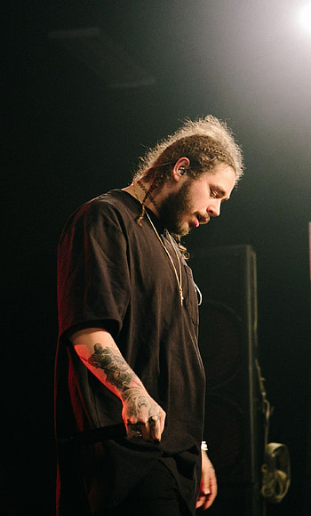 Post Malone, Energetic performance, Mesmerizing stage presence, Dynamic visuals HD phone wallpaper