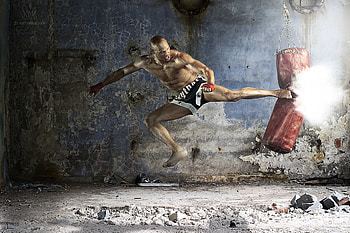 bag work out as part of MMA training regiment HD wallpaper