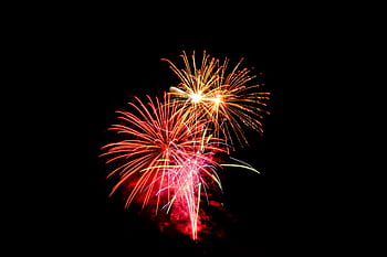 Colorful fireworks exploding in the night sky, perfect for celebrations and festive events. HD wallpaper