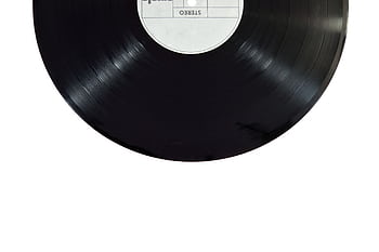 A classic black vinyl record isolated on a white background. HD wallpaper