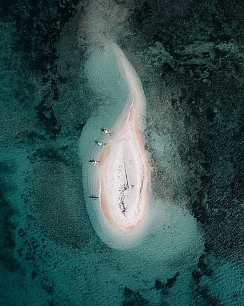 Stunning aerial capture of a secluded island surrounded by turquoise waters in the Philippines. HD phone wallpaper