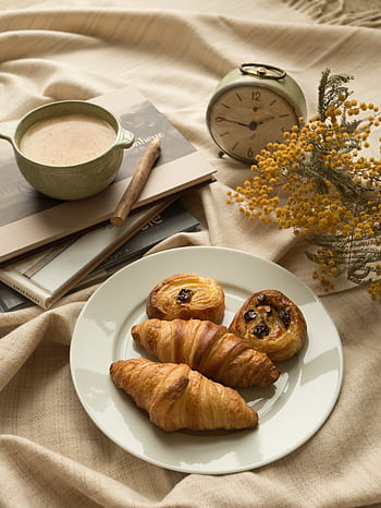 A serene morning scene in Paris with croissants and coffee, perfect for a cozy breakfast. HD phone wallpaper