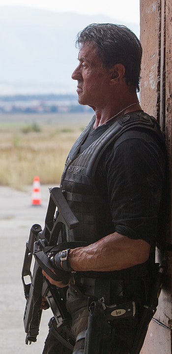 The Expendables, High-octane action, Legendary heroes, Intense showdowns HD phone wallpaper