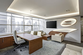 Sleek office space featuring contemporary furniture and city skyline views, ideal for professionals. HD wallpaper