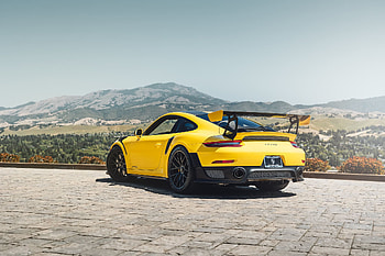 Sunlit Yellow Porsche — Roadside, car, Porsche HD wallpaper