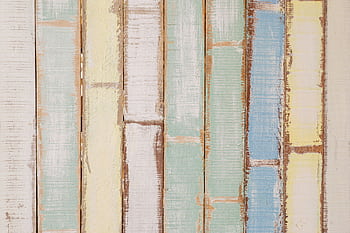 Pastel-colored wood planks background with rustic texture, ideal for design projects. HD wallpaper