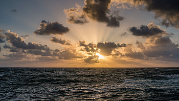 Ocean Waves Sunrise Under Black Clouds Blue Sky Nature HD wallpaper