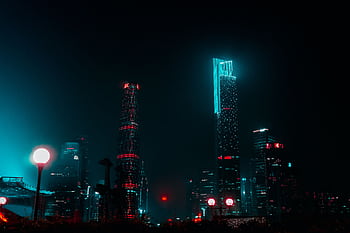 Stunning night view of Guangzhou's skyline with brightly lit skyscrapers creating a mesmerizing urban landscape. HD wallpaper