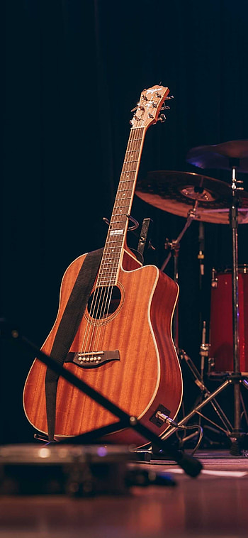 Harmonious melodies, Guitar strumming, Musical passion, Artistic expression HD phone wallpaper