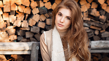 Redhead Girl Model Anna Kudinova Is Sitting In Wood Logs Background Wearing Light Brown Dress Girls HD wallpaper