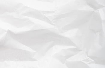 A detailed texture of crumpled white paper with visible folds and creases. HD wallpaper