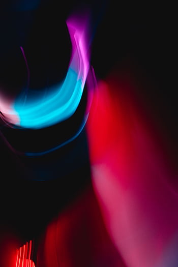 Vibrant abstract of colorful light streaks creating a dynamic, futuristic effect. HD phone wallpaper