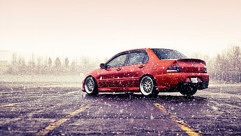 Mitsubishi Lancer Evo, Red snow side view HD wallpaper