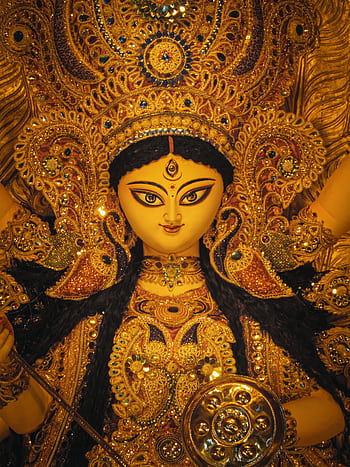 Intricate and colorful idol of Goddess Durga celebrated during the Durga Puja festival in Kolkata, India. HD phone wallpaper