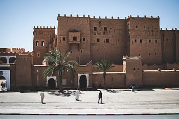 Explore the ancient Kasbah Taourirt, a UNESCO World Heritage site in Ouarzazate, Morocco. HD wallpaper