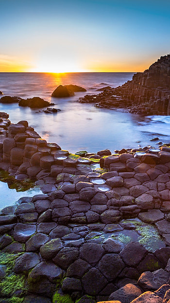 Northern Ireland, Sun setting over Giants Causeway HD phone wallpaper