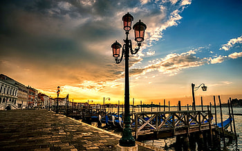 Sunset in Venice, gondola, boat, lanterns, town, peaceful, italy, sunrise, venice, boats, sunset, light, view, nature, romantic, lantern, lovely, italia, grand canal, walk, beauty, buildings, water, sea, gondolas, architecture, city, beautiful, romance, building, clouds, sky, splendor, evening HD wallpaper