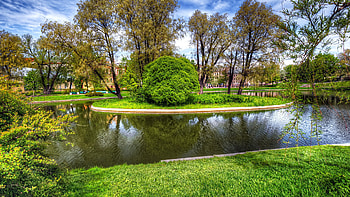 Beautiful Pond Grass Field Green Trees Building Background Under Blue Sky Reflection On Water Nature HD wallpaper