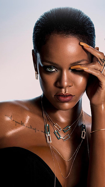 Rihanna, Talented musician, Daring fashion choices, Sensual appeal HD phone wallpaper