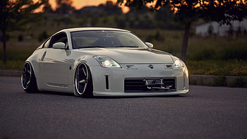 Nissan 350Z stance, JDM Hellaflush , Automotive customization, Modified ride aesthetics HD wallpaper