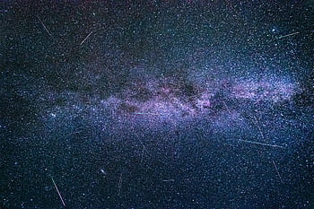 A breathtaking view of a starry night sky showcasing the Milky Way galaxy's beauty. HD wallpaper