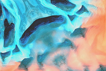 Stunning abstract art featuring dynamic blue and coral colors with fluid patterns. HD wallpaper