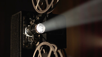 Vintage cinema allure, Classic movie magic, Nostalgic projector reels, Film reel art HD wallpaper