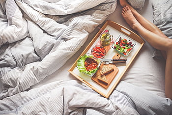 Enjoy a delightful morning with a healthy breakfast on a wooden tray, perfect for a relaxing start to the day. HD wallpaper